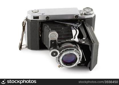 Old folding camera isolated on white background
