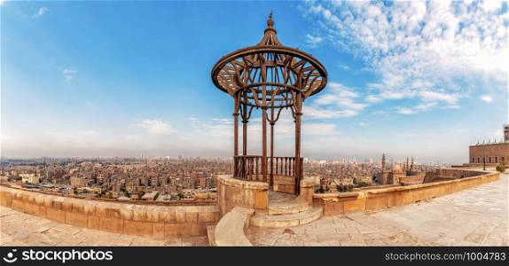 Old forged pavilion in the panorama of Cairo, view of the Citadel.. Old forged pavilion in the panorama of Cairo, view of the Citadel