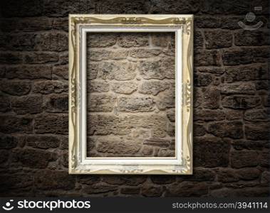 old frame on a brick wall dark baground