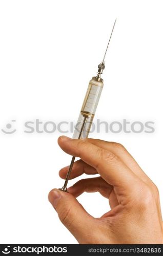 old glass syringe in hand isolated on white