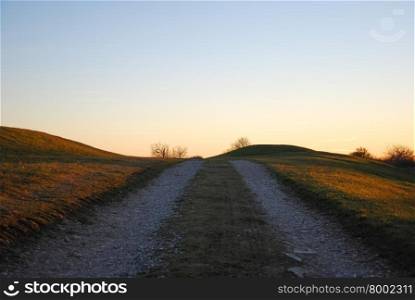 Old gravel road upwards a hill at the swedish island Oland