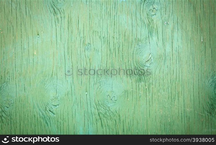 Old green grunge wooden surface background or texture