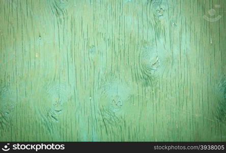 Old green grunge wooden surface background or texture