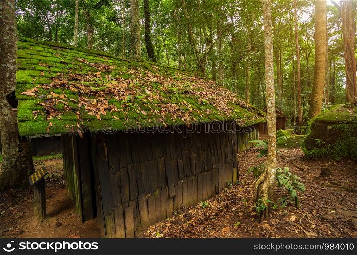 Old green hut wooden political and military school at Phuhinrongkla National Park Nakhon Thai District in Phitsanulok, Thailand.