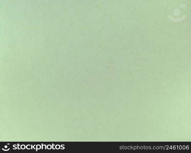 Old green paper grunge texture background. An old green paper grunge texture background