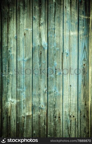 Old grunge blue green wooden panels background or texture
