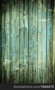 Old grunge blue green wooden panels background or texture