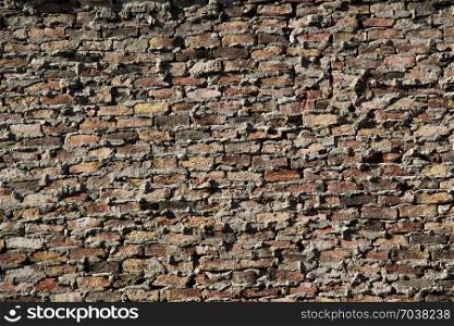 Old grunge brick wall as a background
