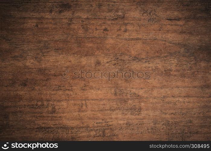 Old grunge dark textured wooden background,The surface of the old brown wood texture,top view brown teak wood paneling