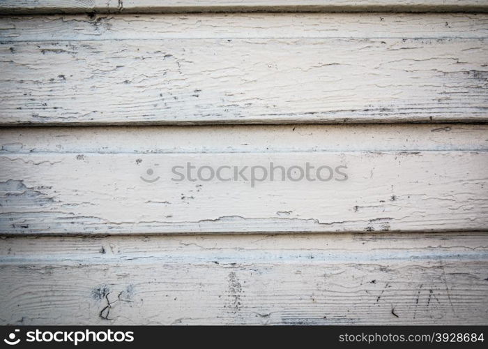 Old grunge gray white wooden panels background or texture