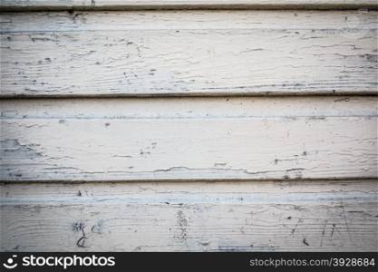 Old grunge gray white wooden panels background or texture