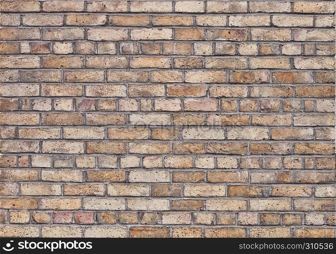 Old grunge orange brick texture background with cracks