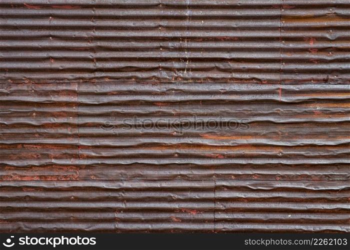 old, grunge, rusty, corrugated metal texture background - wall of weathered shack