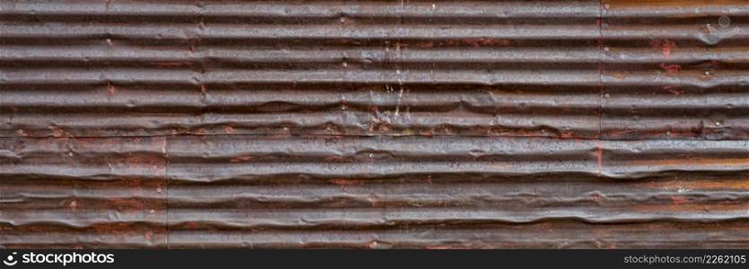 old, grunge, rusty, corrugated metal texture background - wall of weathered shack, panoramic banner