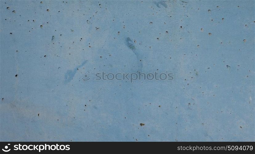 Old grunge wall. Old grunge blue wall texture useful as a background