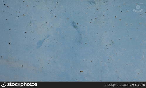 Old grunge wall. Old grunge blue wall texture useful as a background