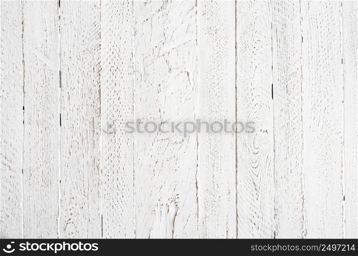 Old grunge white painted wooden planks table texture background flat lay top view