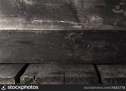 Old grungy and weathered wood surface wall plank texture corner background. Old wood corner background