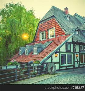 Old half-timbered house in Goslar, Germany. Retro style toned image