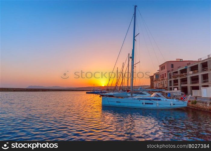 Old harbour with fishing boats and marina of Chania at dawn, Crete, Greece