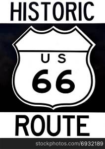 Old historic Route 66 sign with the legend US 66.