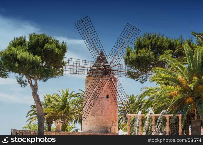 Old historic windmill on a farm of Majorca (Spain)