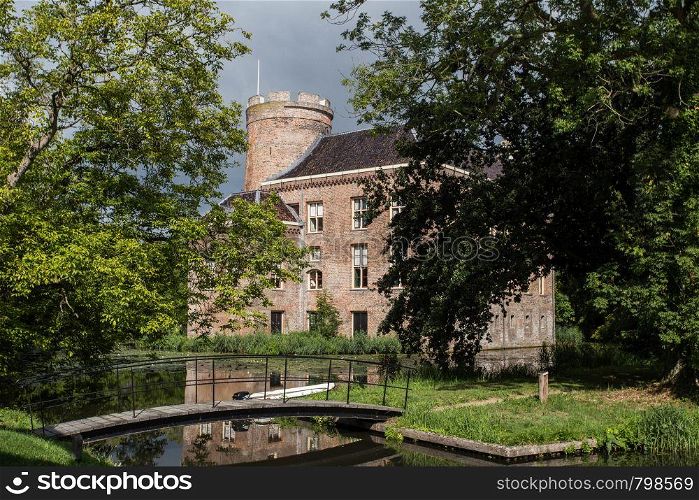 Old historical castle in a forest, Netherlands during fall season autumn Netherlands beauty. Old historical castle in a forest, Netherlands during fall season autumn Netherlands