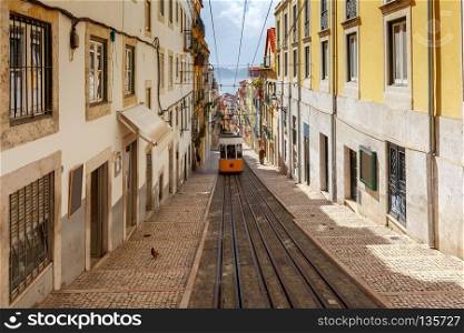 Old historical tram in the street of Lisbon. Portugal.. Lisbon. Old tram.