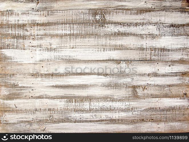 old horizontal background of carelessly painted light paint wood