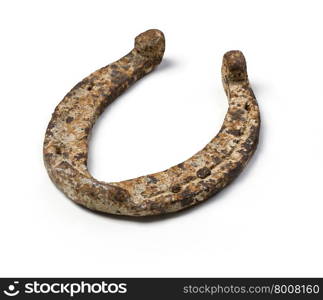 Old horseshoe - a symbol of good luck on white background
