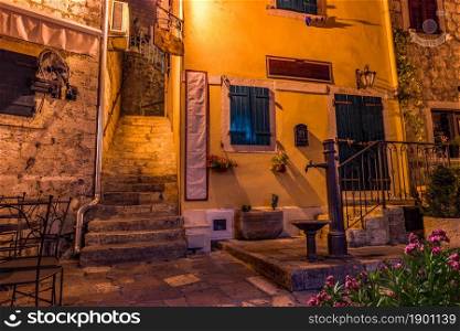 Old house and staircase in Kotor at night. Old house in Kotor