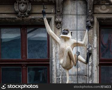 Old House Facade with Monkey Sculpture in Berlin, Germany