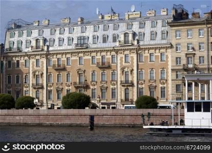 Old house on embarkment of Neva river in St-Petersburg, Russia