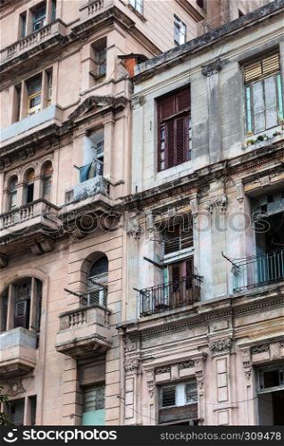 old house with balconies and windows
