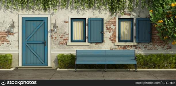 Old house with blue door and windows. Facade with old brick wall,blue door , windows and bench - 3d rendering