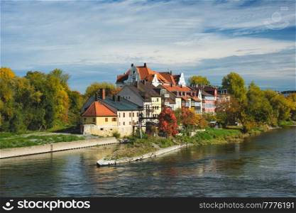 Old houses along Danube River in Regensburg, Bavaria, Germany. Houses along Danube River. Regensburg, Bavaria, Germany