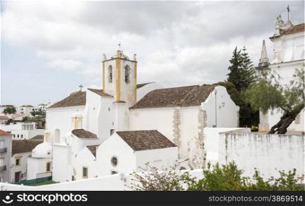 Old houses and churchn in the algarve area of Portugal