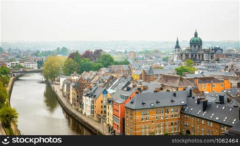 Old houses rooftop panorama with St Aubin&rsquo;s Cathedral and Sambra river in the historical city center of Namur, Wallonia, Belgium