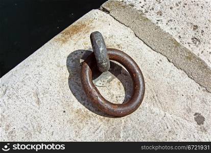 old iron ring for tying boats