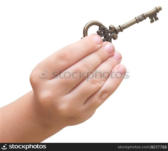 old key in a baby hands isolated on white background
