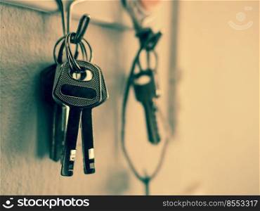 old key vintage hanging on cement wall background