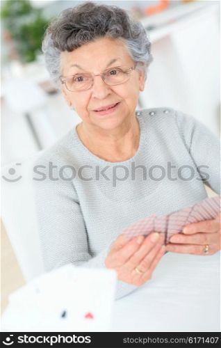 Old lady playing cards