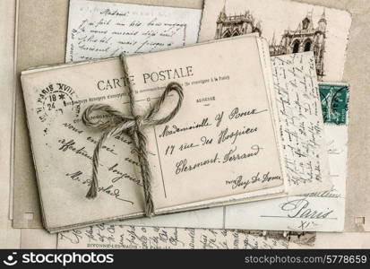 old letters and antique french postcards. vintage sentimental retro style background