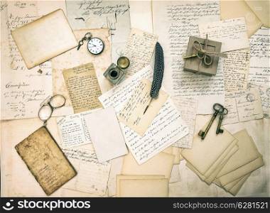 old letters and postcards, vintage accessory and antique book. retro style nostalgic background. top view