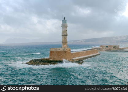 Old lighthouse in Chania, in stormy weather.