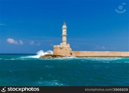 Old lighthouse in Chania in stormy weather.. Lighthouse in Chania. Greece.