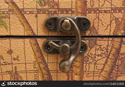 Old lock on a wooden box