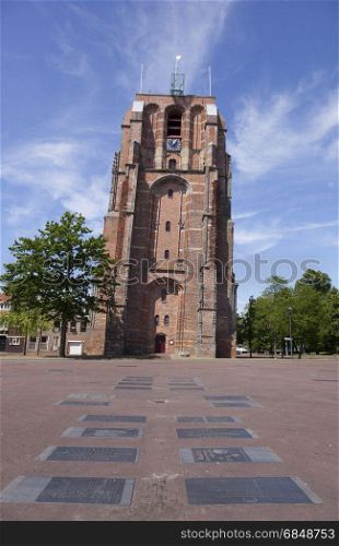 old lopsided tower oldehove tower in the centre of leeuwarden, capital of friesland, in the netherlands with blue sky