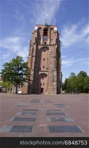 old lopsided tower oldehove tower in the centre of leeuwarden, capital of friesland, in the netherlands with blue sky
