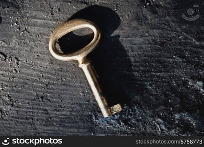 Old lost keys on floorboards closeup